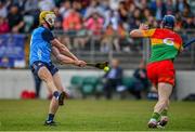 17 June 2023; Mark Grogan of Dublin scores his side's first goal despite the efforts of Diarmuid Byrne of Carlow during the GAA Hurling All-Ireland Senior Championship Preliminary Quarter Final match between Carlow and Dublin at Netwatch Cullen Park in Carlow. Photo by Sam Barnes/Sportsfile