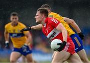 17 June 2023; Ethan Doherty of Derry in action against Ciaran Russell of Clare during the GAA Football All-Ireland Senior Championship Round 3 match between Derry and Clare at Glennon Brothers Pearse Park in Longford. Photo by Stephen Marken/Sportsfile