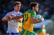17 June 2023; Daire Ó Baoill of Donegal in action against Karl Gallagher of Monaghan during the GAA Football All-Ireland Senior Championship Round 3 match between Monaghan and Donegal at O'Neills Healy Park in Omagh, Tyrone. Photo by Ramsey Cardy/Sportsfile