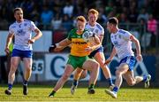 17 June 2023; Oisin Gallen of Donegal in action against Monaghan players, from left, Kieran Duffy, Ryan O'Toole and Karl O Connell during the GAA Football All-Ireland Senior Championship Round 3 match between Monaghan and Donegal at O'Neills Healy Park in Omagh, Tyrone. Photo by Ramsey Cardy/Sportsfile