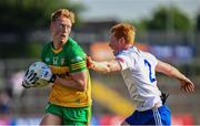 17 June 2023; Oisin Gallen of Donegal in action against Ryan O'Toole of Monaghan during the GAA Football All-Ireland Senior Championship Round 3 match between Monaghan and Donegal at O'Neills Healy Park in Omagh, Tyrone. Photo by Ramsey Cardy/Sportsfile
