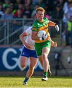 17 June 2023; Oisin Gallen of Donegal in action against Ryan O'Toole of Monaghan during the GAA Football All-Ireland Senior Championship Round 3 match between Monaghan and Donegal at O'Neills Healy Park in Omagh, Tyrone. Photo by Ramsey Cardy/Sportsfile