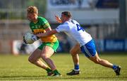 17 June 2023; Oisin Gallen of Donegal in action against Ryan Wylie of Monaghan during the GAA Football All-Ireland Senior Championship Round 3 match between Monaghan and Donegal at O'Neills Healy Park in Omagh, Tyrone. Photo by Ramsey Cardy/Sportsfile