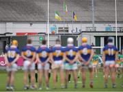 17 June 2023; Tipperary players stand for Amhrán na bhFiann before the GAA Hurling All-Ireland Senior Championship Preliminary Quarter Final match between Offaly and Tipperary at Glenisk O'Connor Park in Tullamore, Offaly. Photo by Michael P Ryan/Sportsfile