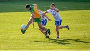 17 June 2023; Caolan McGonagle of Donegal in action against Conor Boyle, left, and Conor McCarthy of Monaghan during the GAA Football All-Ireland Senior Championship Round 3 match between Monaghan and Donegal at O'Neills Healy Park in Omagh, Tyrone. Photo by Ramsey Cardy/Sportsfile
