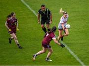 17 June 2023; Daire Kiely of Cork on the attack as referee Séamus Mulvihill looks on during the TG4 All-Ireland Ladies Senior Football Championship Round 1 match between Galway and Cork at Pearse Stadium in Galway. Photo by Piaras Ó Mídheach/Sportsfile