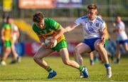 17 June 2023; Odhran Doherty of Donegal in action against Michael Bannigan of Monaghan during the GAA Football All-Ireland Senior Championship Round 3 match between Monaghan and Donegal at O'Neills Healy Park in Omagh, Tyrone. Photo by Ramsey Cardy/Sportsfile