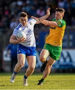 17 June 2023; Michael Bannigan of Monaghan in action against Mark Curran of Donegal during the GAA Football All-Ireland Senior Championship Round 3 match between Monaghan and Donegal at O'Neills Healy Park in Omagh, Tyrone. Photo by Ramsey Cardy/Sportsfile