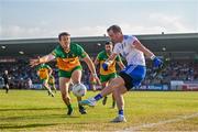 17 June 2023; Jack McCarron of Monaghan in action against Hugh McFadden of Donegal during the GAA Football All-Ireland Senior Championship Round 3 match between Monaghan and Donegal at O'Neills Healy Park in Omagh, Tyrone. Photo by Ramsey Cardy/Sportsfile