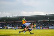 17 June 2023; Jack McCarron of Monaghan in action against Brendan McCole of Donegal during the GAA Football All-Ireland Senior Championship Round 3 match between Monaghan and Donegal at O'Neills Healy Park in Omagh, Tyrone. Photo by Ramsey Cardy/Sportsfile