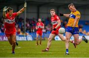 17 June 2023; Darragh Bohannon of Clare takes a shot during the GAA Football All-Ireland Senior Championship Round 3 match between Derry and Clare at Glennon Brothers Pearse Park in Longford. Photo by Stephen Marken/Sportsfile
