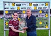 17 June 2023; Nicola Ward of Galway receives the Player of the Match award from Alan Esslemont, CEO TG4, after the TG4 All-Ireland Ladies Senior Football Championship Round 1 match between Galway and Cork at Pearse Stadium in Galway. Photo by Piaras Ó Mídheach/Sportsfile