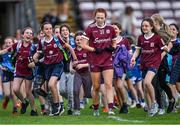 17 June 2023; Galway supporters run to Kate Slevin of Galway after the TG4 All-Ireland Ladies Senior Football Championship Round 1 match between Galway and Cork at Pearse Stadium in Galway. Photo by Piaras Ó Mídheach/Sportsfile