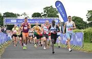 18 June 2023; Peter Somba of Dunboyne AC, Meath, second from right, and Martin Hoare of Celbridge AC, Kildare, far right, lead the field at the start of the 2023 Irish Life Dublin Race Series – Corkagh Park 5 Mile at Corkagh Park in Clondalkin, Dublin. Photo by Sam Barnes/Sportsfile