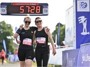 18 June 2023; Sarah Thornberry, left, and Jess Tobin celebrate after finishing the 2023 Irish Life Dublin Race Series – Corkagh Park 5 Mile at Corkagh Park in Clondalkin, Dublin. Photo by Sam Barnes/Sportsfile