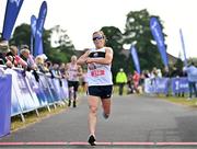 18 June 2023; Grace Kennedy-Clarke of Donore Harriers, Dublin, crosses the line to finish third in the women's event of the 2023 Irish Life Dublin Race Series – Corkagh Park 5 Mile at Corkagh Park in Clondalkin, Dublin. Photo by Sam Barnes/Sportsfile