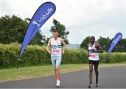 18 June 2023;  Martin Hoare of Celbridge AC, Kildare, left, and Peter Somba of Dunboyne AC, Meath, warm up before the 2023 Irish Life Dublin Race Series – Corkagh Park 5 Mile at Corkagh Park in Clondalkin, Dublin. Photo by Sam Barnes/Sportsfile
