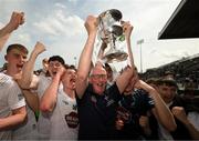 13 May 2023; Kildare kitman Mick Curley celebrates with the cup after the Eirgrid GAA Football All-Ireland U20 Championship Final between Kildare and Sligo at Kingspan Breffni in Cavan. Photo by Stephen McCarthy/Sportsfile