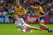 18 June 2023; Daniel Flynn of Kildare in action against Donie Smith, left, and Brian Stack of Roscommon during the GAA Football All-Ireland Senior Championship Round 3 match between Roscommon and Kildare at Glenisk O'Connor Park in Tullamore, Offaly. Photo by Daire Brennan/Sportsfile