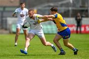 18 June 2023; Neil Flynn of Kildare in action against David Murray of Roscommon during the GAA Football All-Ireland Senior Championship Round 3 match between Roscommon and Kildare at Glenisk O'Connor Park in Tullamore, Offaly. Photo by Daire Brennan/Sportsfile
