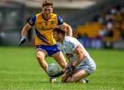 18 June 2023; Kevin Feely of Kildare in action against Dylan Ruane of Roscommon during the GAA Football All-Ireland Senior Championship Round 3 match between Roscommon and Kildare at Glenisk O'Connor Park in Tullamore, Offaly. Photo by Daire Brennan/Sportsfile
