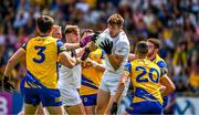 18 June 2023; Kevin Feely of Kildare in action against Niall Daly, left, and Ciarán Lennon of Roscommon during the GAA Football All-Ireland Senior Championship Round 3 match between Roscommon and Kildare at Glenisk O'Connor Park in Tullamore, Offaly. Photo by Daire Brennan/Sportsfile