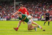 18 June 2023; Tony Brosnan of Kerry in action against Tommy Durnin of Louth during the GAA Football All-Ireland Senior Championship Round 3 match between Kerry and Louth at Laois Hire O'Moore Park in Portaloise, Laois. Photo by Michael P Ryan/Sportsfile
