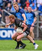 18 June 2023; Sean Carrabine of Sligo in action against Paul Mannion of Dublin during the GAA Football All-Ireland Senior Championship Round 3 match between Dublin and Sligo at Kingspan Breffni in Cavan. Photo by Ramsey Cardy/Sportsfile