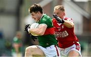 18 June 2023; Paddy Durcan of Mayo is tackled by Killian O'Hanlon of Cork during the GAA Football All-Ireland Senior Championship Round 3 match between Cork and Mayo at TUS Gaelic Grounds in Limerick. Photo by Eóin Noonan/Sportsfile