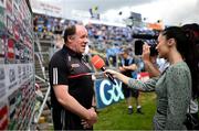 18 June 2023; Tyrone joint-manager Feargal Logan is interviewed by GAAGO reporter Aisling O'Reilly before the GAA Football All-Ireland Senior Championship Round 3 match between Tyrone and Westmeath at Kingspan Breffni in Cavan. Photo by Ramsey Cardy/Sportsfile