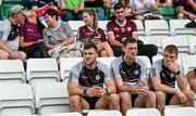 18 June 2023; Damien Comer of Galway, left, watches the warmup from the stand before the GAA Football All-Ireland Senior Championship Round 3 match between Galway and Armagh at Avant Money Páirc Seán Mac Diarmada in Carrick-on-Shannon, Leitrim. Photo by Harry Murphy/Sportsfile