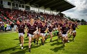 18 June 2023; Galway players break from the team photo before  the GAA Football All-Ireland Senior Championship Round 3 match between Galway and Armagh at Avant Money Páirc Seán Mac Diarmada in Carrick-on-Shannon, Leitrim. Photo by Harry Murphy/Sportsfile