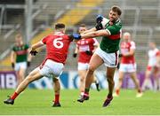 18 June 2023; Aidan O'Shea of Mayo in action against Daniel O Mahony of Cork during the GAA Football All-Ireland Senior Championship Round 3 match between Cork and Mayo at TUS Gaelic Grounds in Limerick. Photo by Eóin Noonan/Sportsfile