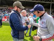 18 June 2023; Louth manager Mickey Harte with his son Matthew and grandson, Malachy, age 6 months during the GAA Football All-Ireland Senior Championship Round 3 match between Kerry and Louth at Laois Hire O'Moore Park in Portaloise, Laois. Photo by Michael P Ryan/Sportsfile