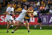 18 June 2023; Ben O'Carroll of Roscommon in action against Ryan Houlihan of Kildare during the GAA Football All-Ireland Senior Championship Round 3 match between Roscommon and Kildare at Glenisk O'Connor Park in Tullamore, Offaly. Photo by Daire Brennan/Sportsfile