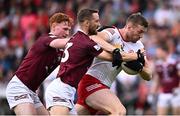 18 June 2023; Brian Kennedy of Tyrone is tackled by Kevin Maguire of Westmeath during the GAA Football All-Ireland Senior Championship Round 3 match between Tyrone and Westmeath at Kingspan Breffni in Cavan. Photo by Ramsey Cardy/Sportsfile