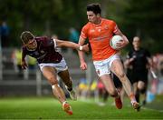 18 June 2023; Ben Crealey of Armagh in action against Billy Mannion of Galway during the GAA Football All-Ireland Senior Championship Round 3 match between Galway and Armagh at Avant Money Páirc Seán Mac Diarmada in Carrick-on-Shannon, Leitrim. Photo by Harry Murphy/Sportsfile