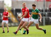 18 June 2023; Conor Grimes of Louth in action against David Clifford of Kerry during the GAA Football All-Ireland Senior Championship Round 3 match between Kerry and Louth at Laois Hire O'Moore Park in Portaloise, Laois. Photo by Michael P Ryan/Sportsfile