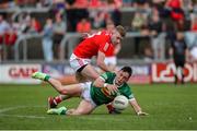 18 June 2023; Paudie Clifford of Kerry in action against Peter Lynch of Louth during the GAA Football All-Ireland Senior Championship Round 3 match between Kerry and Louth at Laois Hire O'Moore Park in Portaloise, Laois. Photo by Michael P Ryan/Sportsfile