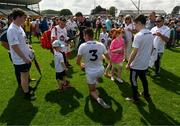 18 June 2023; Shea Ryan of Kildare with supporters after the GAA Football All-Ireland Senior Championship Round 3 match between Roscommon and Kildare at Glenisk O'Connor Park in Tullamore, Offaly. Photo by Daire Brennan/Sportsfile