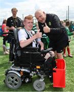 18 June 2023; FAI President Gerry McAnaney and St John Bosco player Sean Rooney during the Football For All National Blitz on the Sport Ireland Campus in Dublin. Photo by Seb Daly/Sportsfile