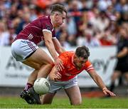 18 June 2023; Conor  O Neill of Armagh in action against John McGrath of Galway during the GAA Football All-Ireland Senior Championship Round 3 match between Galway and Armagh at Avant Money Páirc Seán Mac Diarmada in Carrick-on-Shannon, Leitrim. Photo by Harry Murphy/Sportsfile