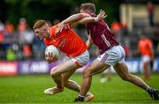 18 June 2023; Ciaran Mackin of Armagh in action against Jack Glynn of Galway during the GAA Football All-Ireland Senior Championship Round 3 match between Galway and Armagh at Avant Money Páirc Seán Mac Diarmada in Carrick-on-Shannon, Leitrim. Photo by Harry Murphy/Sportsfile