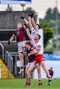 18 June 2023; Ray Connellan of Westmeath and Joe Oguz of Tyrone compete for the throw-in during the GAA Football All-Ireland Senior Championship Round 3 match between Tyrone and Westmeath at Kingspan Breffni in Cavan. Photo by Ramsey Cardy/Sportsfile