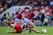 18 June 2023; Ronan McNamee of Tyrone in action against Stephen Smith, left, and Ronan O'Toole of Westmeath during the GAA Football All-Ireland Senior Championship Round 3 match between Tyrone and Westmeath at Kingspan Breffni in Cavan. Photo by Ramsey Cardy/Sportsfile