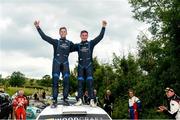 18 June 2023; Callum Devine and Noel O'Sullivan with their VW Polo GTI R5 celebrate after winning  the Wilton Recycling Donegal International Rally Round 5 of the Irish Tarmac Championship at Portsalon, Donegal. Photo by Philip Fitzpatrick/Sportsfile