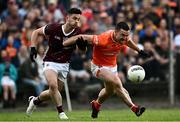 18 June 2023; Aidan  Forker of Armagh in action against Ian Burke of Galway during the GAA Football All-Ireland Senior Championship Round 3 match between Galway and Armagh at Avant Money Páirc Seán Mac Diarmada in Carrick-on-Shannon, Leitrim. Photo by Harry Murphy/Sportsfile