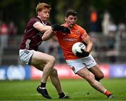 18 June 2023; Paddy Burns of Armagh in action against Peter Cooke of Galway during the GAA Football All-Ireland Senior Championship Round 3 match between Galway and Armagh at Avant Money Páirc Seán Mac Diarmada in Carrick-on-Shannon, Leitrim. Photo by Harry Murphy/Sportsfile