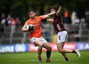 18 June 2023; Paddy Burns of Armagh in action against Shane Walsh  of Galway during the GAA Football All-Ireland Senior Championship Round 3 match between Galway and Armagh at Avant Money Páirc Seán Mac Diarmada in Carrick-on-Shannon, Leitrim. Photo by Harry Murphy/Sportsfile