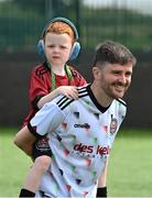 18 June 2023; Bohemians Youths player Caeson Dwyer, age 7, and his father Paul during the Football For All National Blitz on the Sport Ireland Campus in Dublin. Photo by Seb Daly/Sportsfile